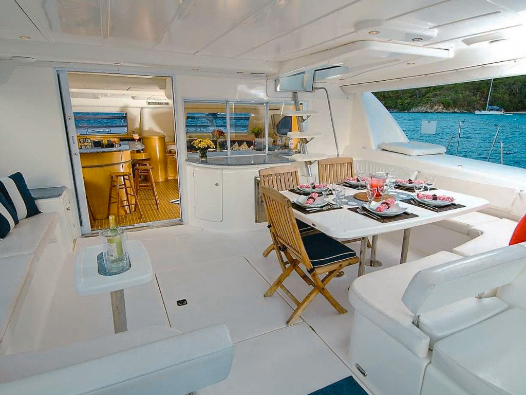 Front deck of 63 Leopard yacht with large sun pads