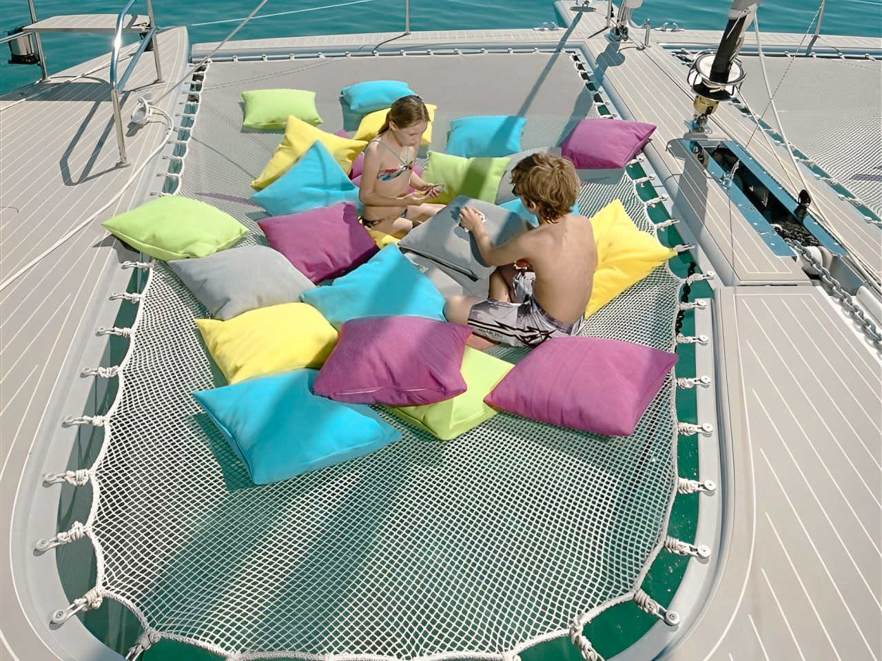 Guests relaxing on the deck of 74 Sunreef II yacht