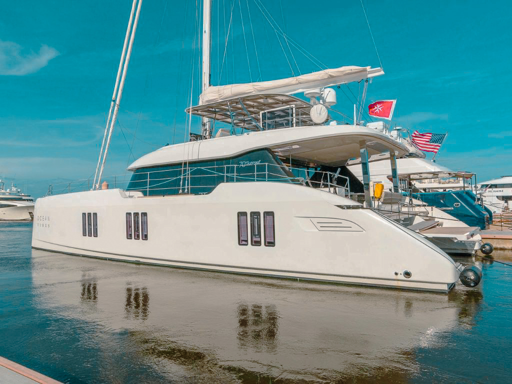Guests enjoying the deck of the 74 Sunreef yacht