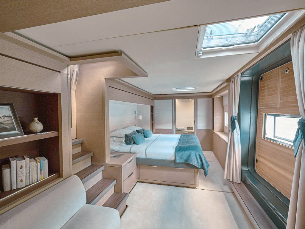 Master cabin of 76 CNB Bordeaux with large bed and windows