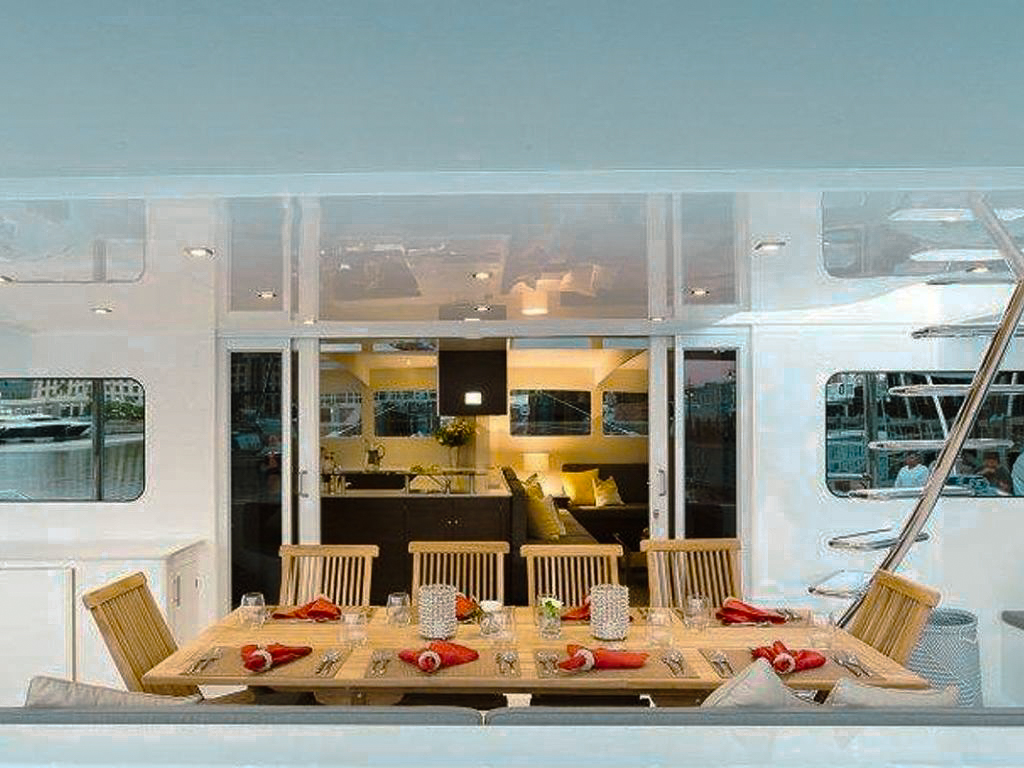 Aerial view of 76 Matrix yacht anchored near a beautiful Caribbean beach
