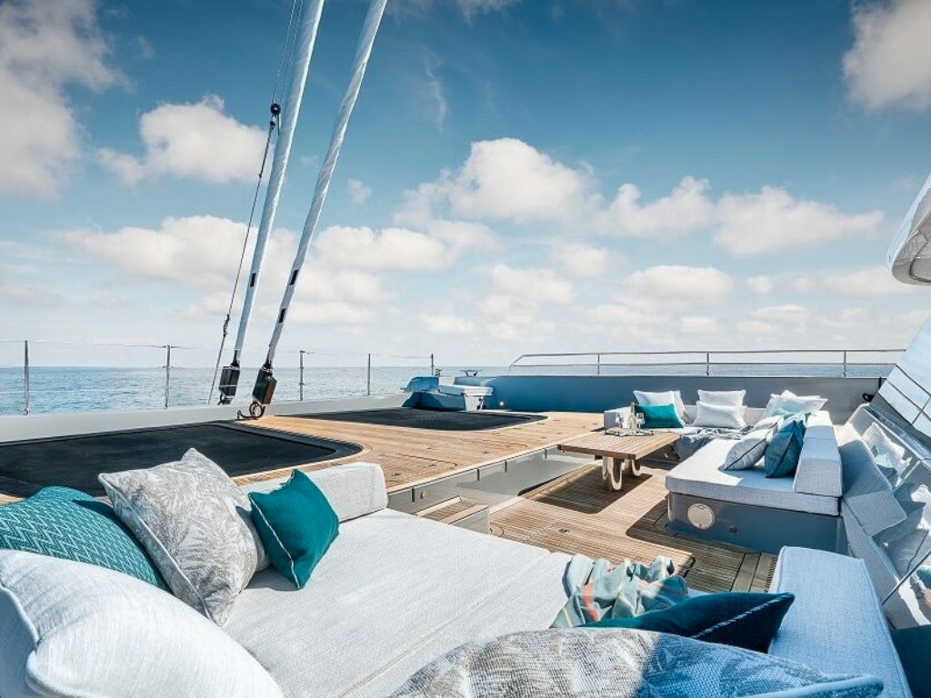 80 Sunreef VI yacht cruising in clear blue waters