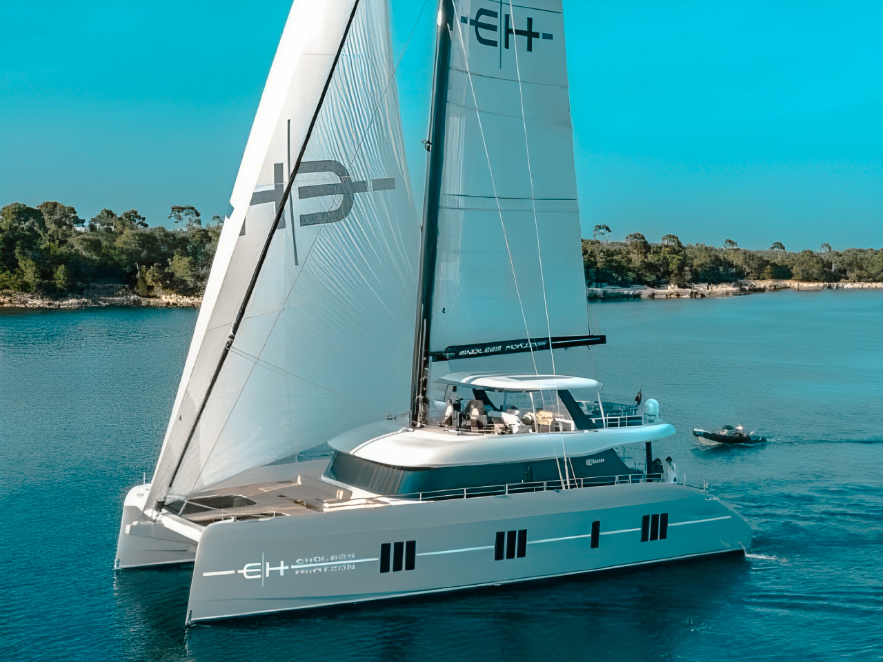 80 Sunreef I yacht from the side with people on deck