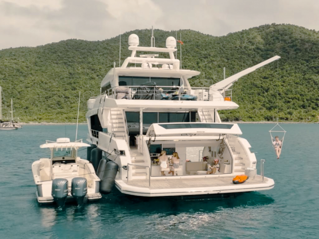 Front deck of 90 Horizon yacht with sunpads and seating