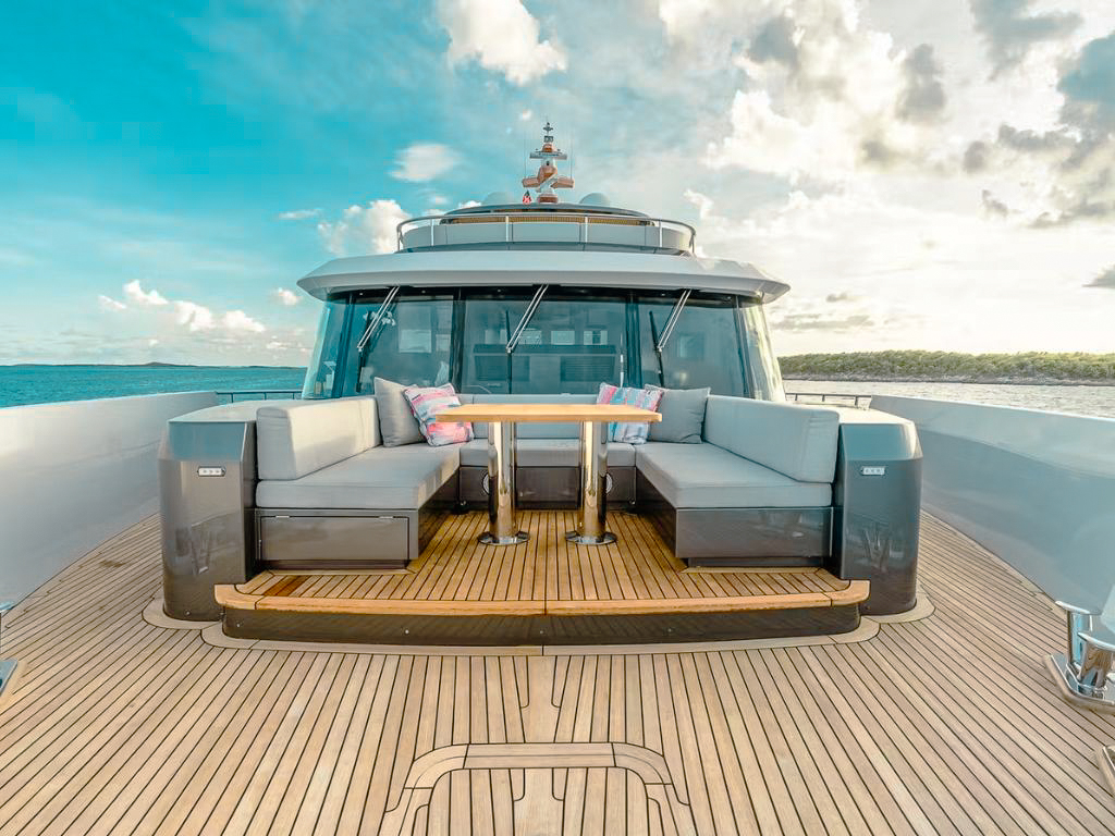 Jacuzzi and outdoor seating area on 102 Alpha yacht