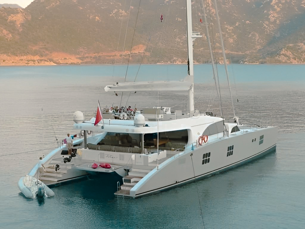 Wide exterior shot of the 102 Sunreef yacht from the side
