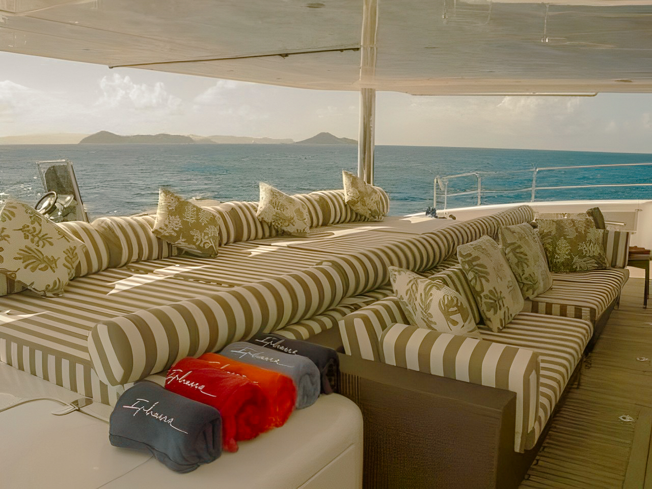 Guests relaxing on the spacious forward deck of the 102 Sunreef yacht