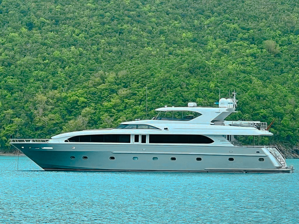 Side view of 104 Intermarine yacht cruising in the Caribbean