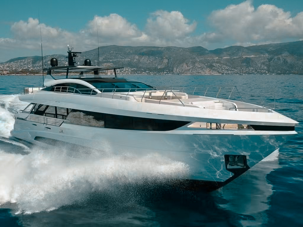 Back view of the 110 Mangusta with a water slide and inviting swimming platform