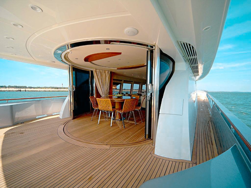 Stern of 114 Couach yacht with water slide deployed