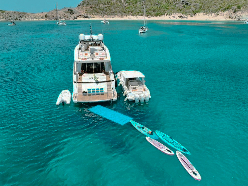 View of 114 Couach yacht from the front with clear blue sky