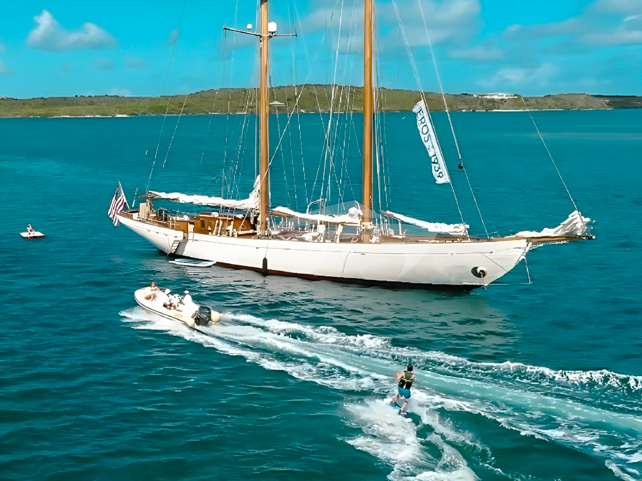 Guests relaxing on the deck of the 115 Brooks Marine yacht with stunning views