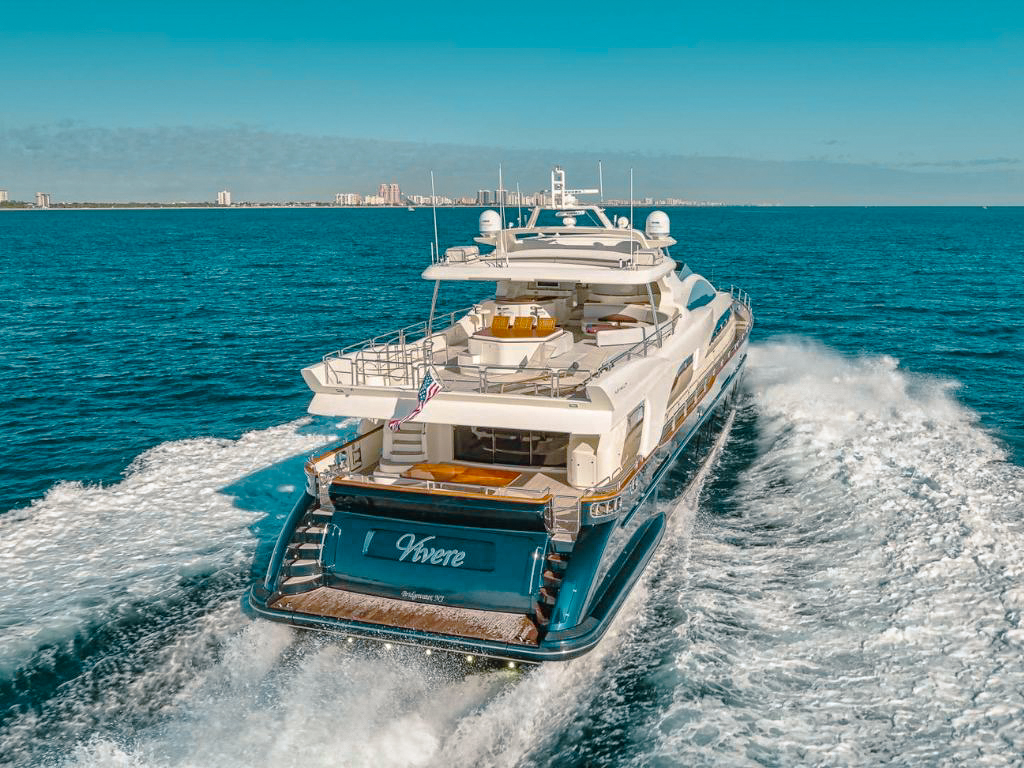A large bed in a master cabin on 116 Azimut I yacht