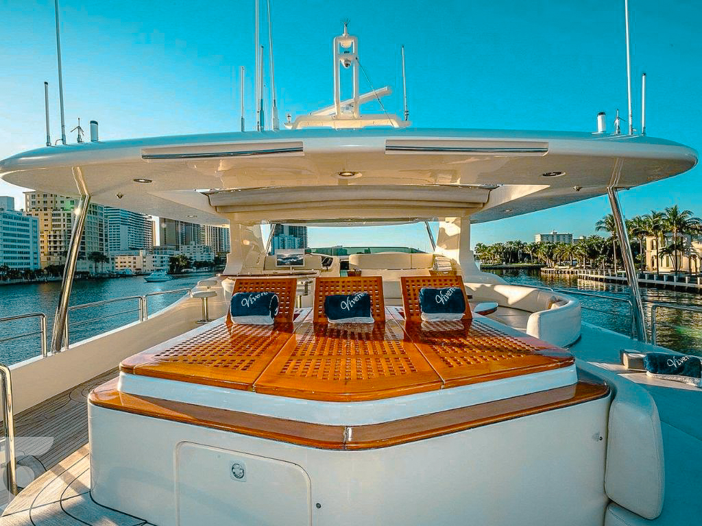 Guests relaxing on deck of 116 Azimut I yacht with ocean views