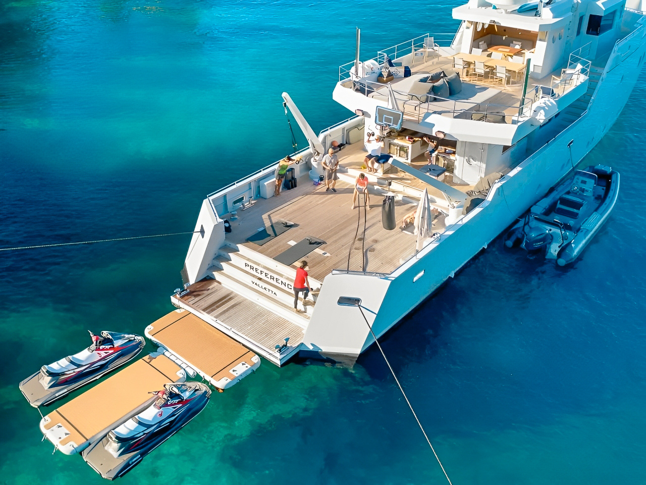Rear view of 119 Tansu yacht at anchor