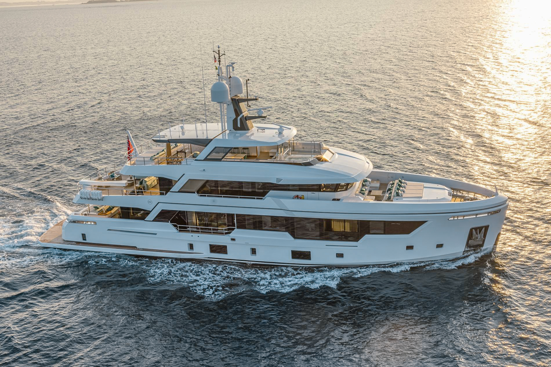 125ft Rosetti Superyacht docked in a beautiful Caribbean marina, ready for charter guests.