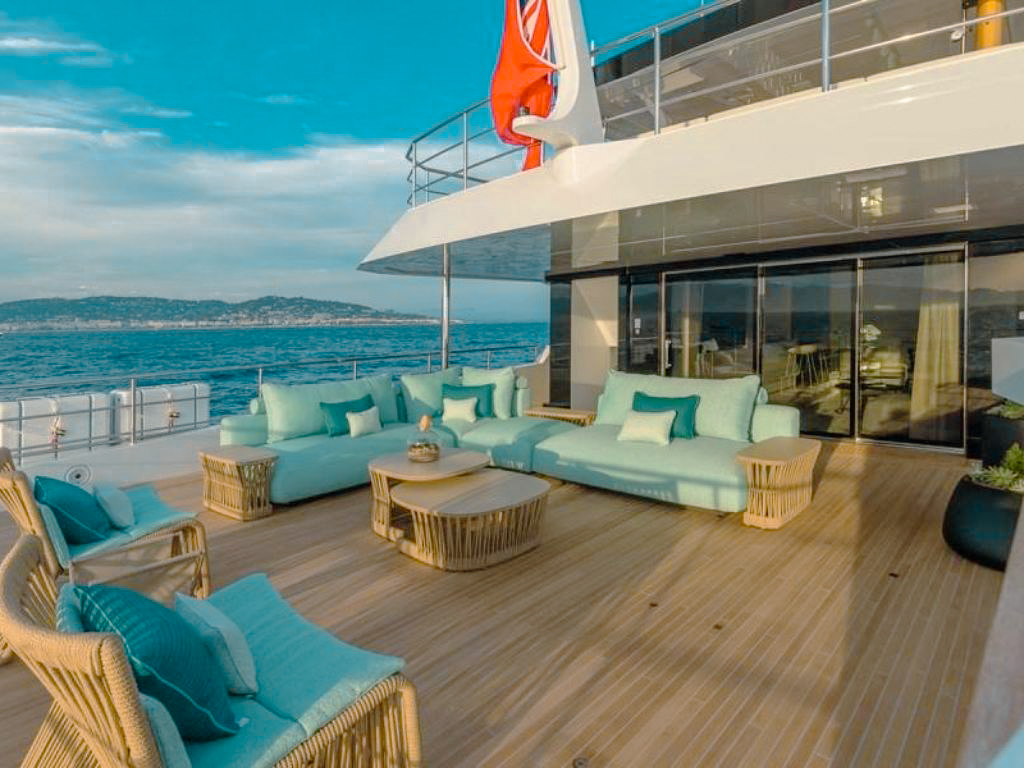 125 Rosetti yacht's luxurious sundeck with lounge seating