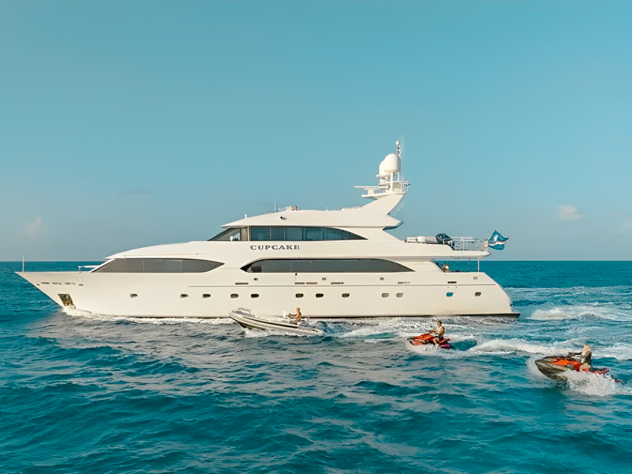 Luxury 132ft Westship yacht cruising on sparkling blue Caribbean waters for charter
