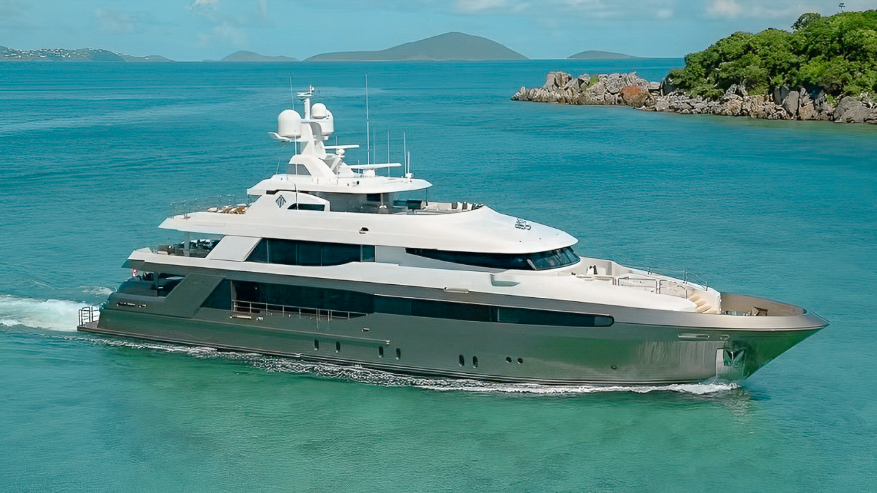 144ft Crescent yacht cruising in clear Caribbean waters, luxury charter available
