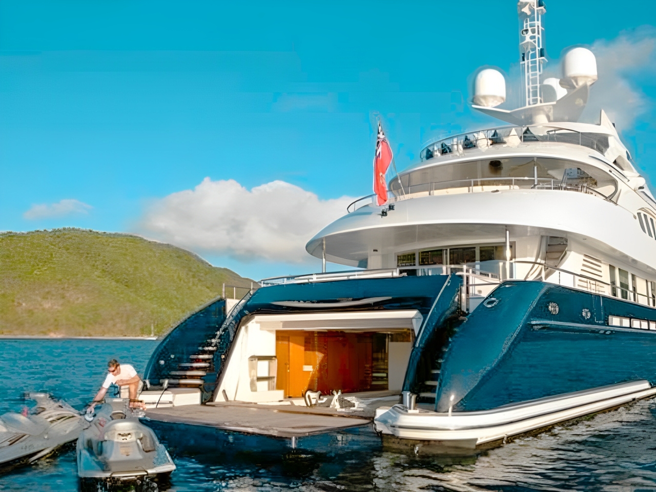 Stern view of 155 Heesen yacht with water toys in the Caribbean