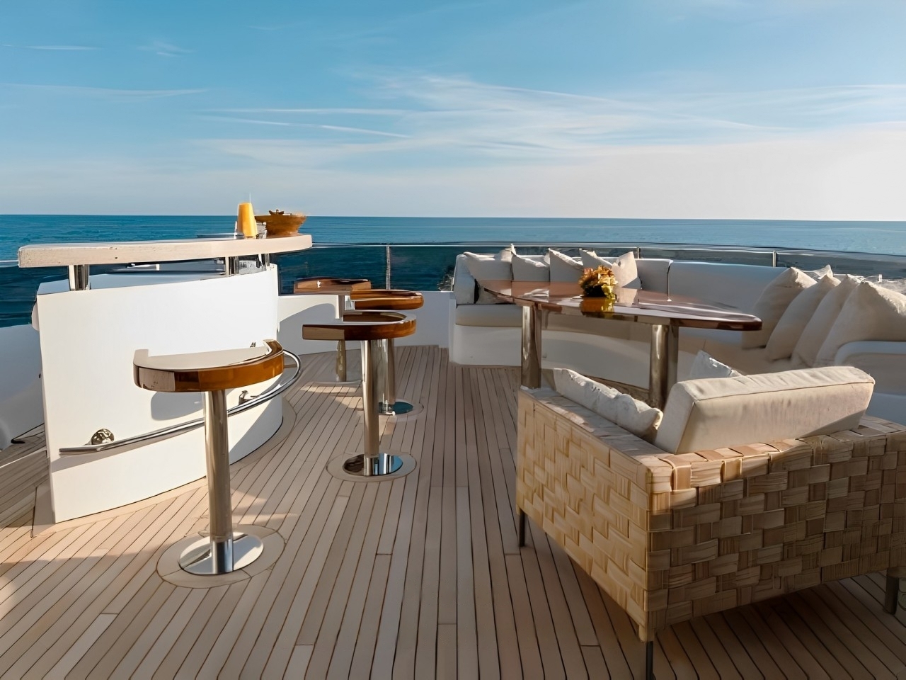 155 Heesen yacht's sundeck with sunpads and a pool