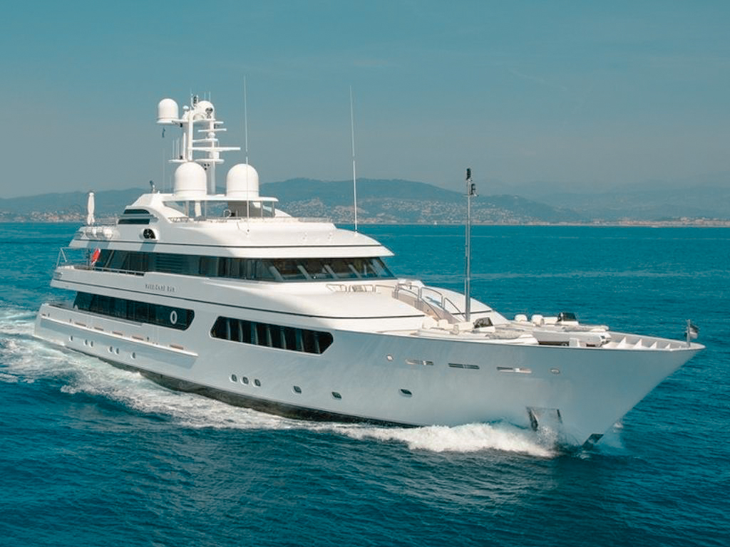 Side view of 176 Feadship cruising in the Caribbean