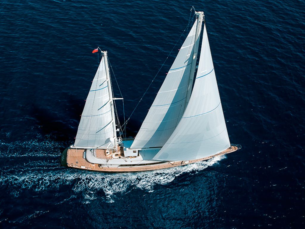 Side view of the 185 Perini Navi yacht at anchor