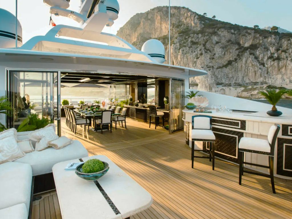 Aerial view of 190 Benetti yacht in a tranquil bay