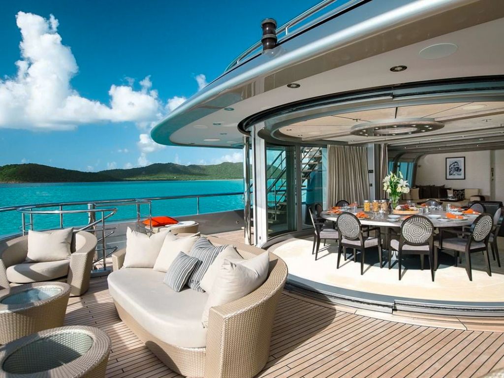 The 197 CMN yacht's luxurious dining area on deck
