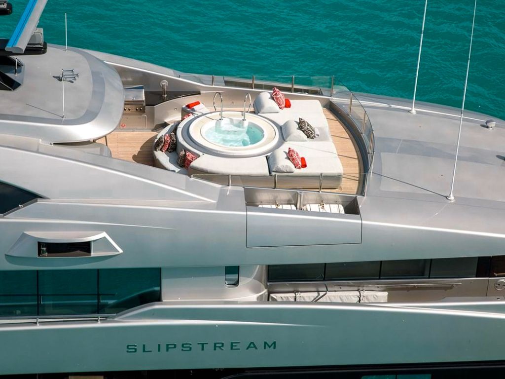 Side view of the 197 CMN yacht at sunset