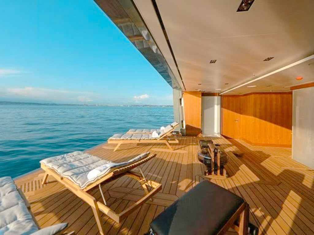 A large, luxurious lounge area on the 240 Admiral yacht