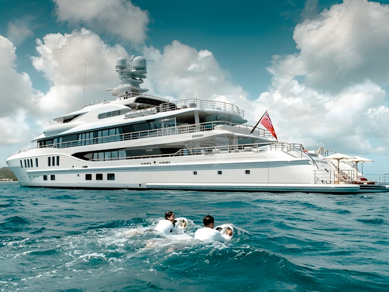 Luxury 242ft Amels yacht sailing the clear blue waters of the Caribbean