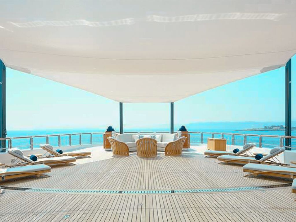 The main deck of 290 Oceanco yacht with seating and views