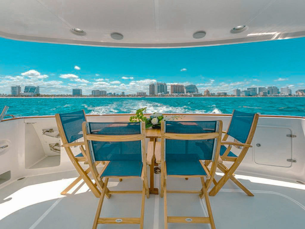 A wide view of the yacht's deck and lounge areas on 63 Nordhavn