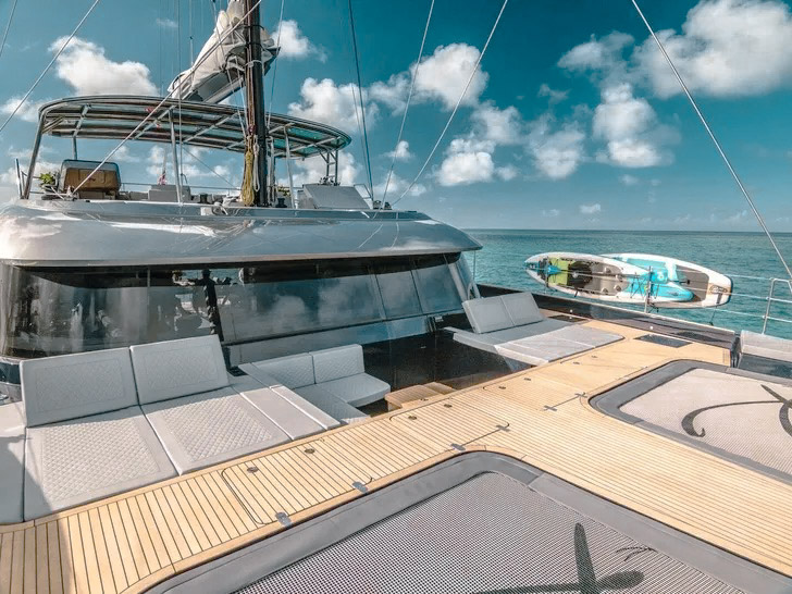 Interior salon of 60 Sunreef II yacht with dining table