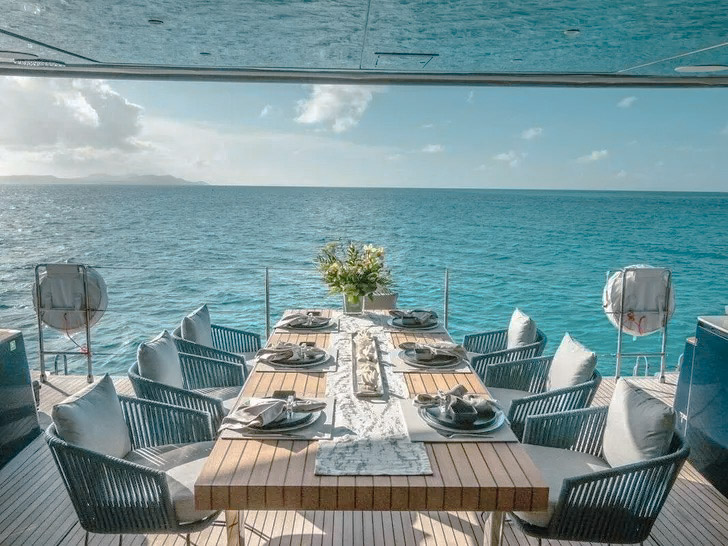 A group enjoying the dining area on 60 Sunreef II yacht