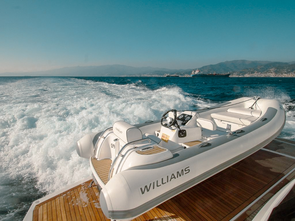People enjoying the foredeck of the 92 Sunseeker