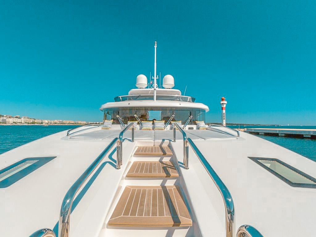 Rear view of 92 Benetti yacht with swimming platform open
