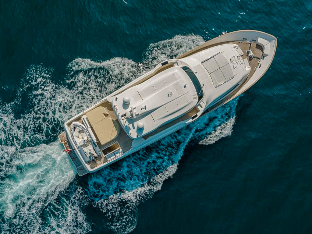 Sun deck of 85 Ferretti yacht with lounge chairs
