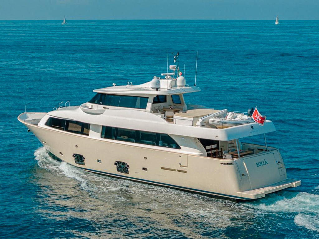 Luxurious 85ft Ferretti yacht docked in Nice, France, ready for charter.