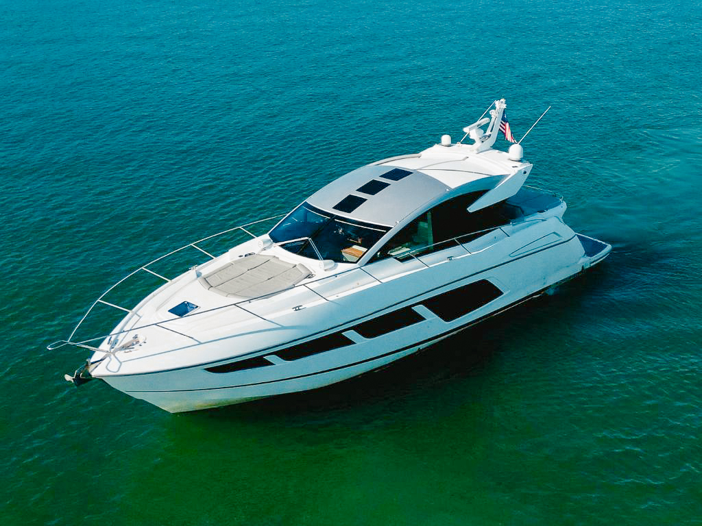 Luxury 60ft Sunseeker yacht available for charter in Miami, perfect for scenic cruises.