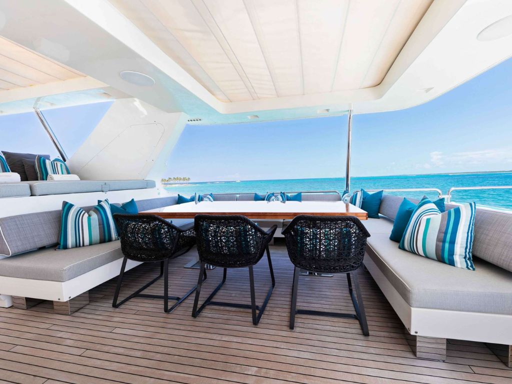 A group enjoying water activities from the 105 Azimut II yacht