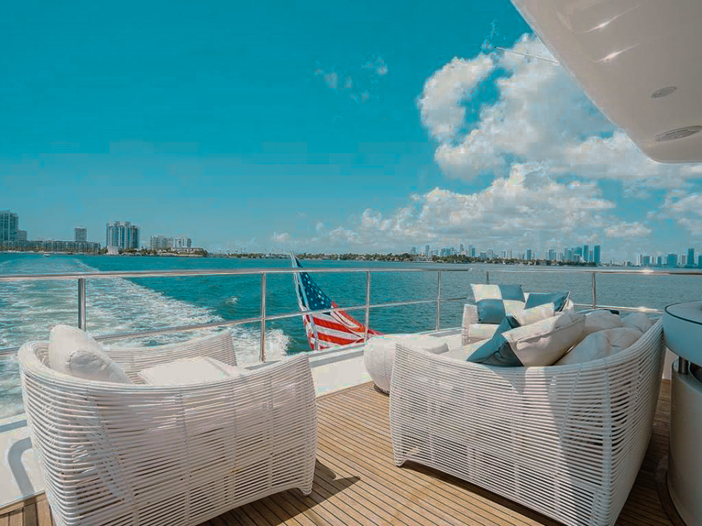 76 Ferretti yacht master cabin showing a large bed and bright interior
