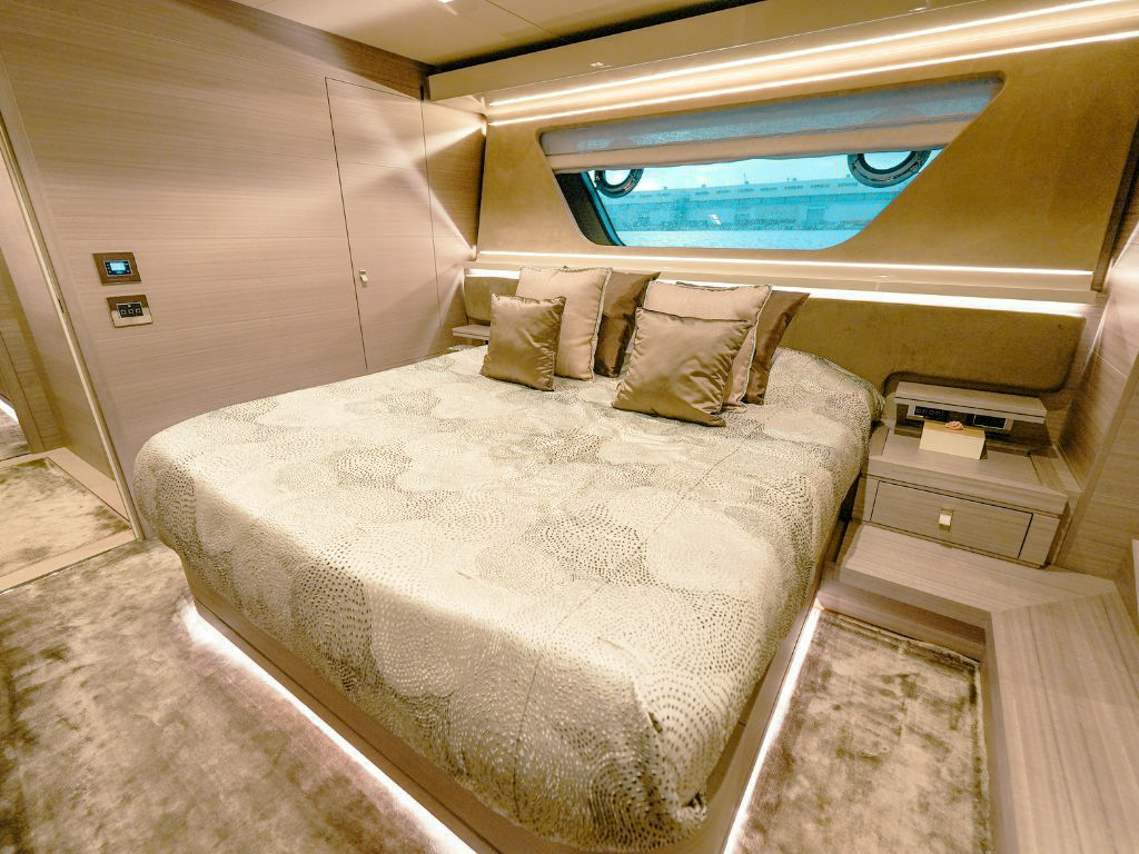 Rear deck area of 94 Custom Line with dining table and seating