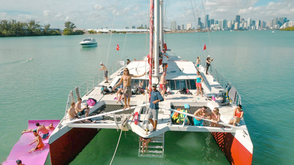 The back deck of the 80 Sailing yacht showing seating and water access