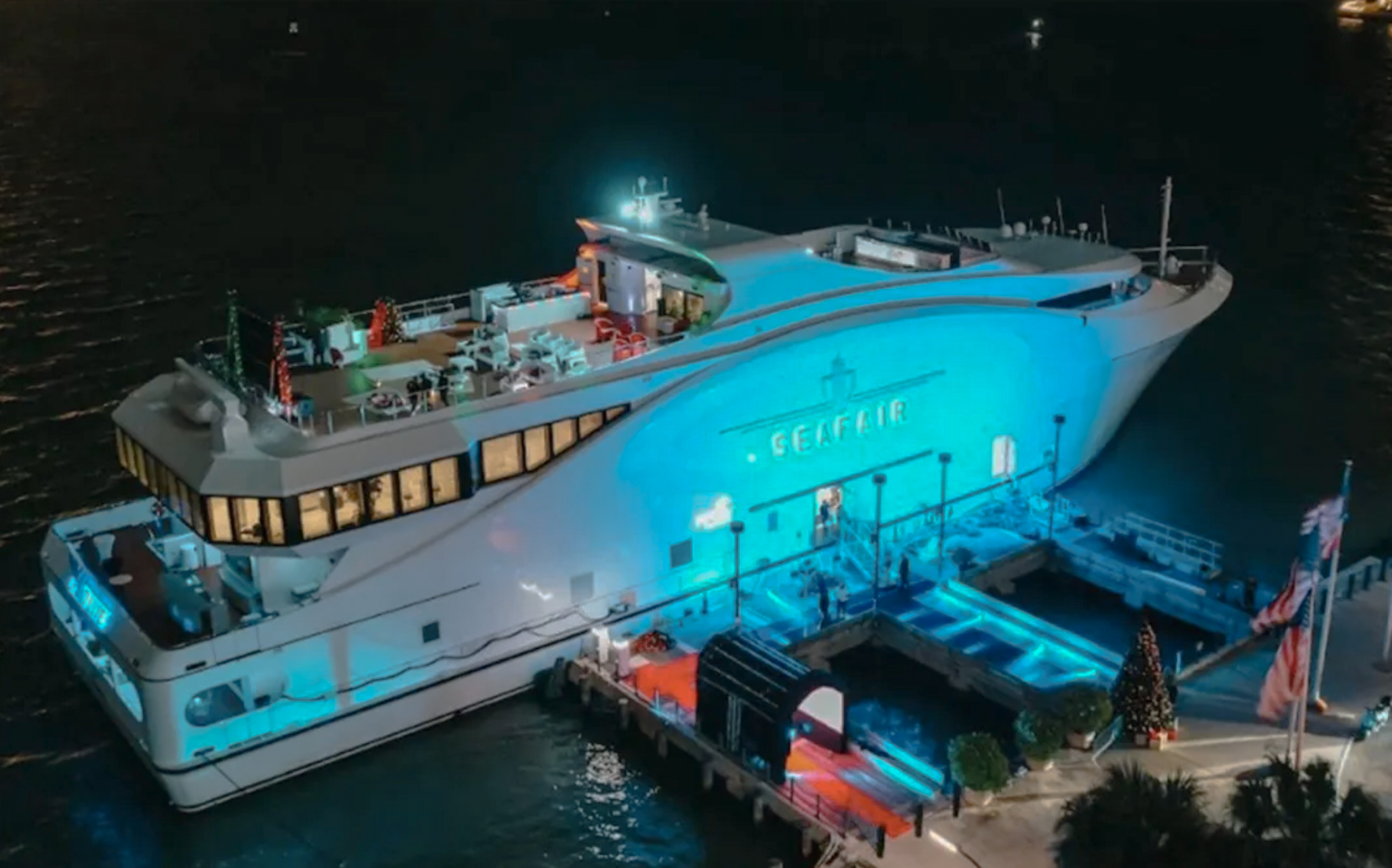 Spacious deck area on the 222 Nichols Brother yacht, set up for an event