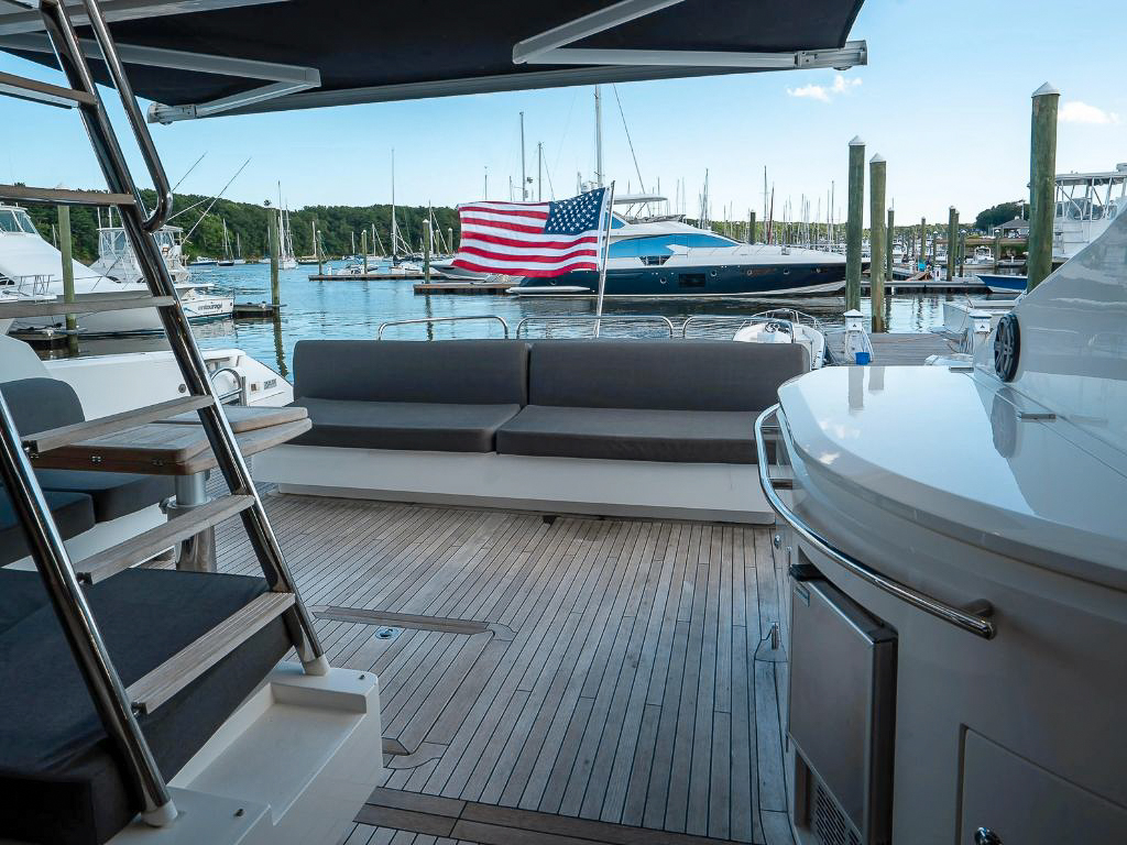 Aft deck of the 74 Sunseeker with seating and dining area