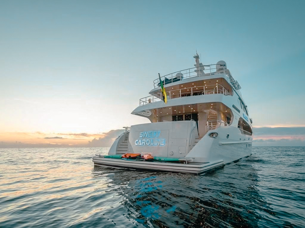 127 IAG yacht aft deck with dining area