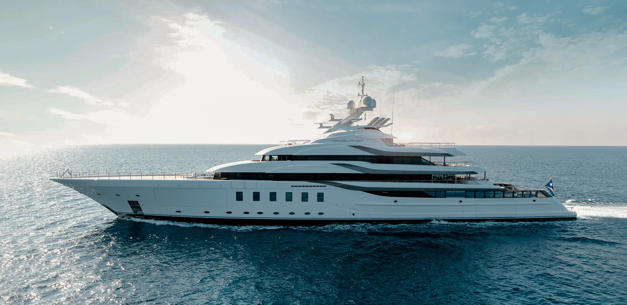 Luxury 312ft Lurssen yacht charter cruising in the crystal clear waters of the Caribbean.