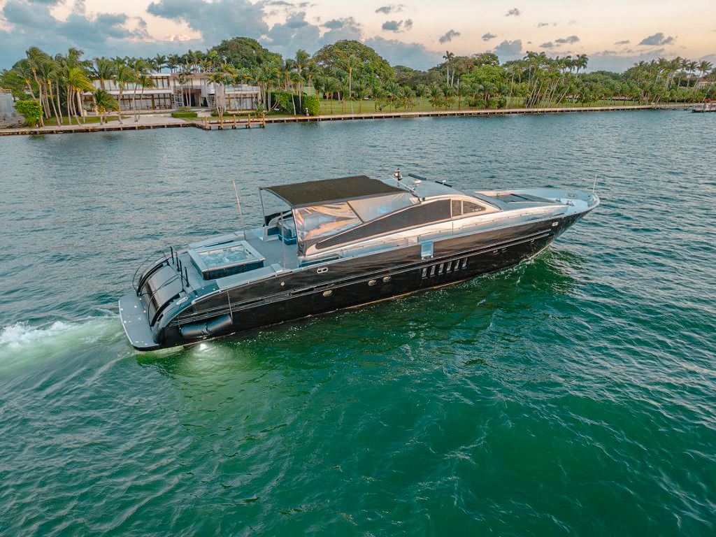 Luxury 94ft Leopard yacht charter cruising the waters of Miami on a sunny day.